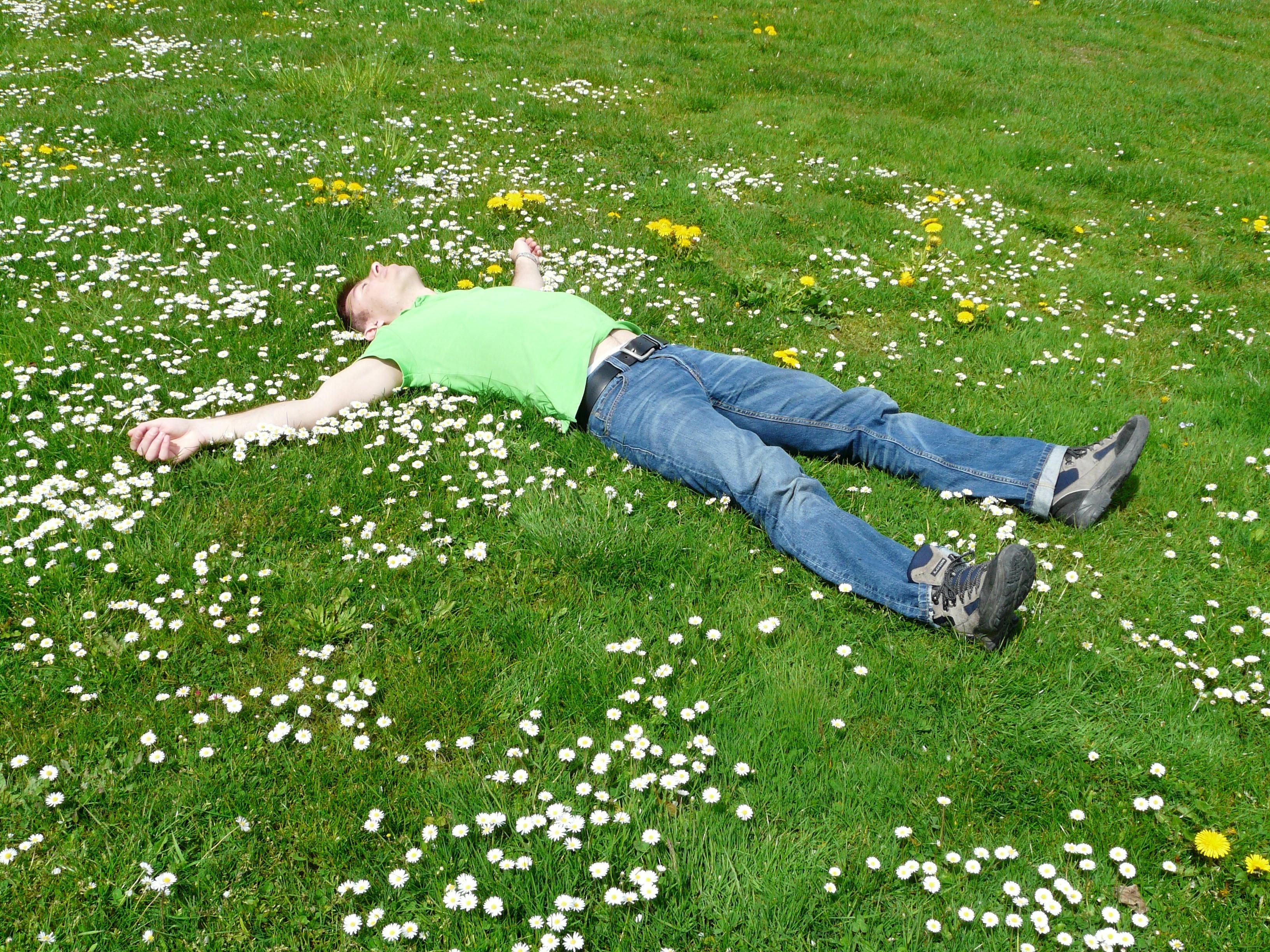 Man lying on grass | Source: Pexels