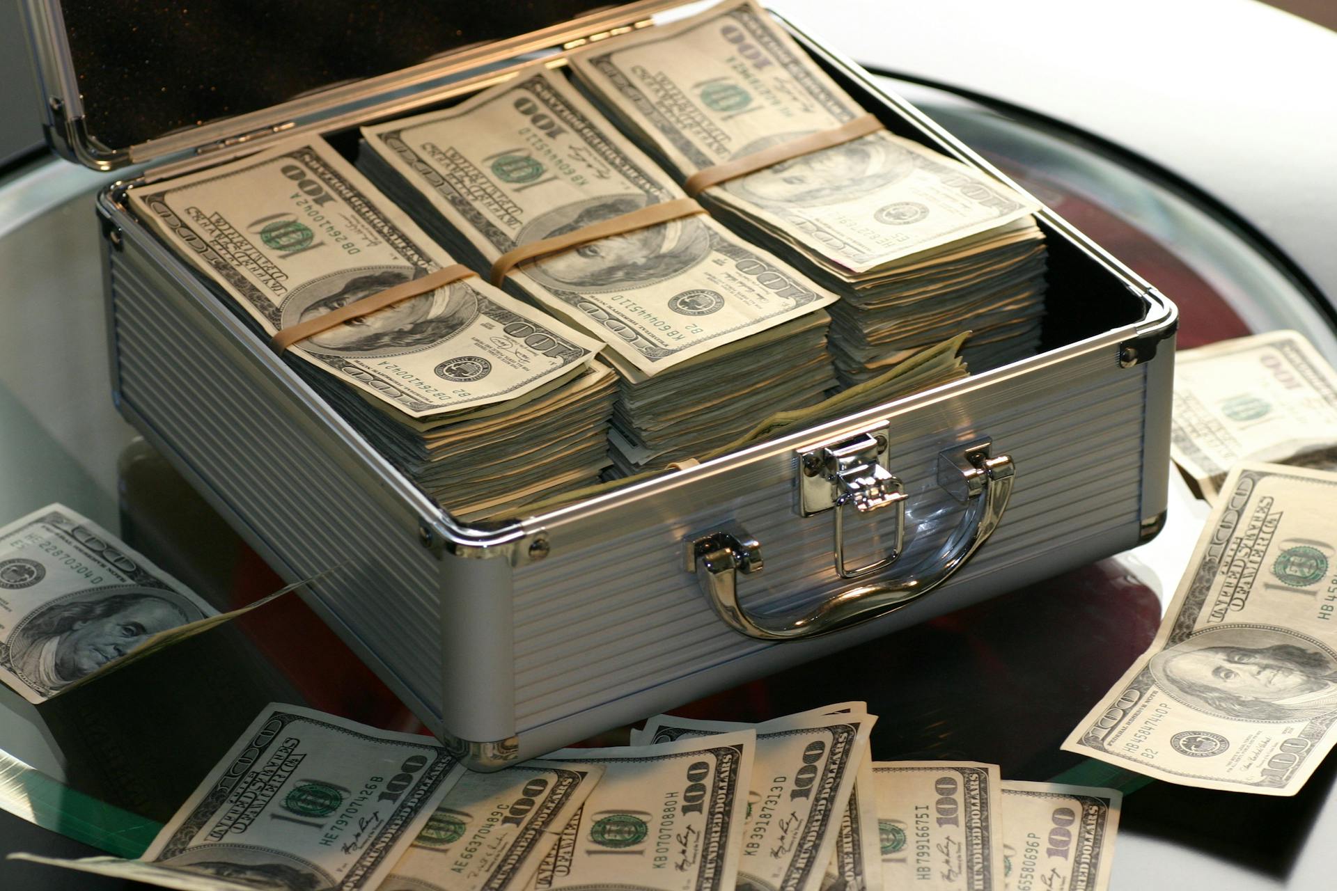 Dollar bills in a briefcase | Source: Pexels