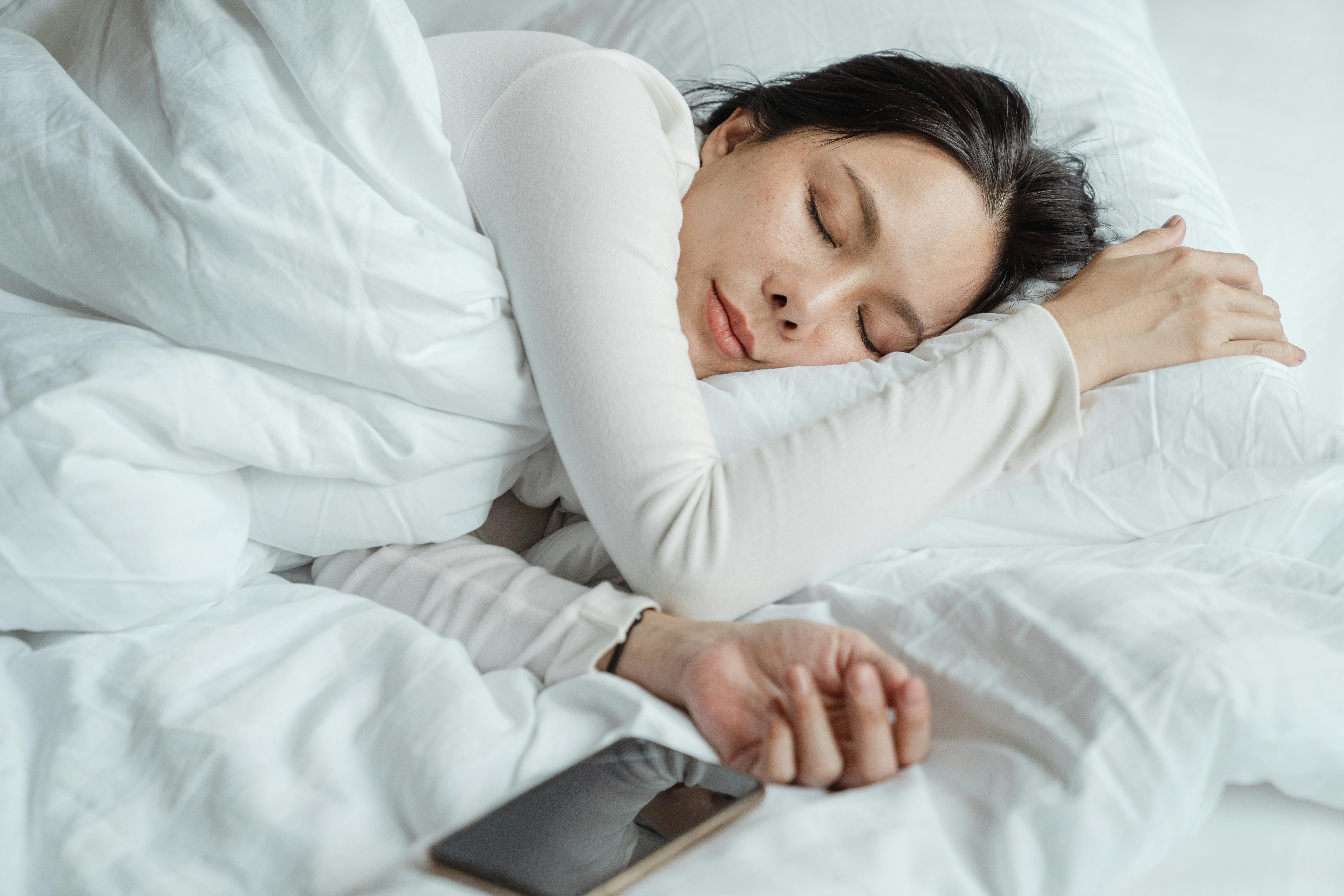 Photo of a sleeping woman | Source: Pexels