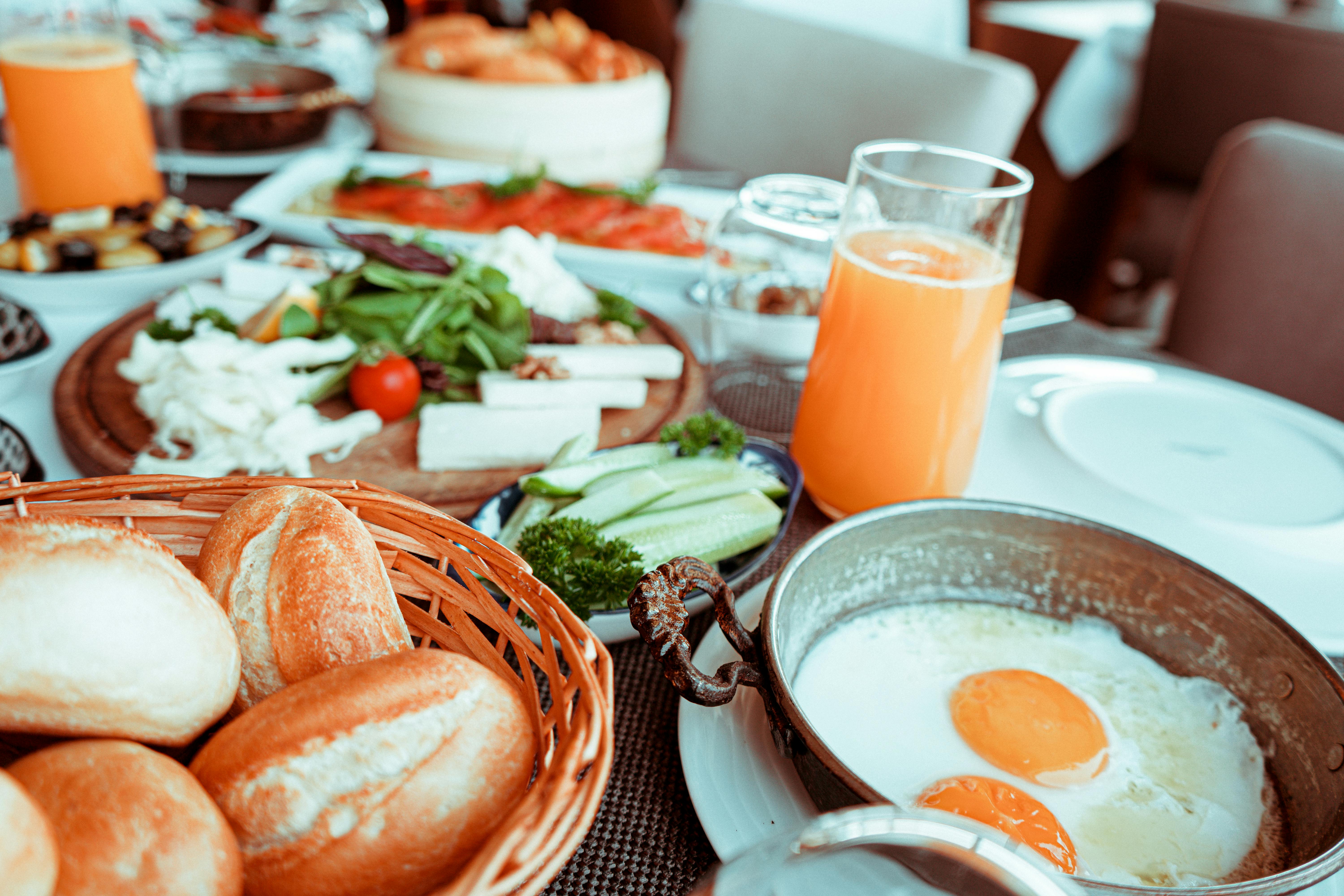 Fried eggs next to bread | Source: Pexels