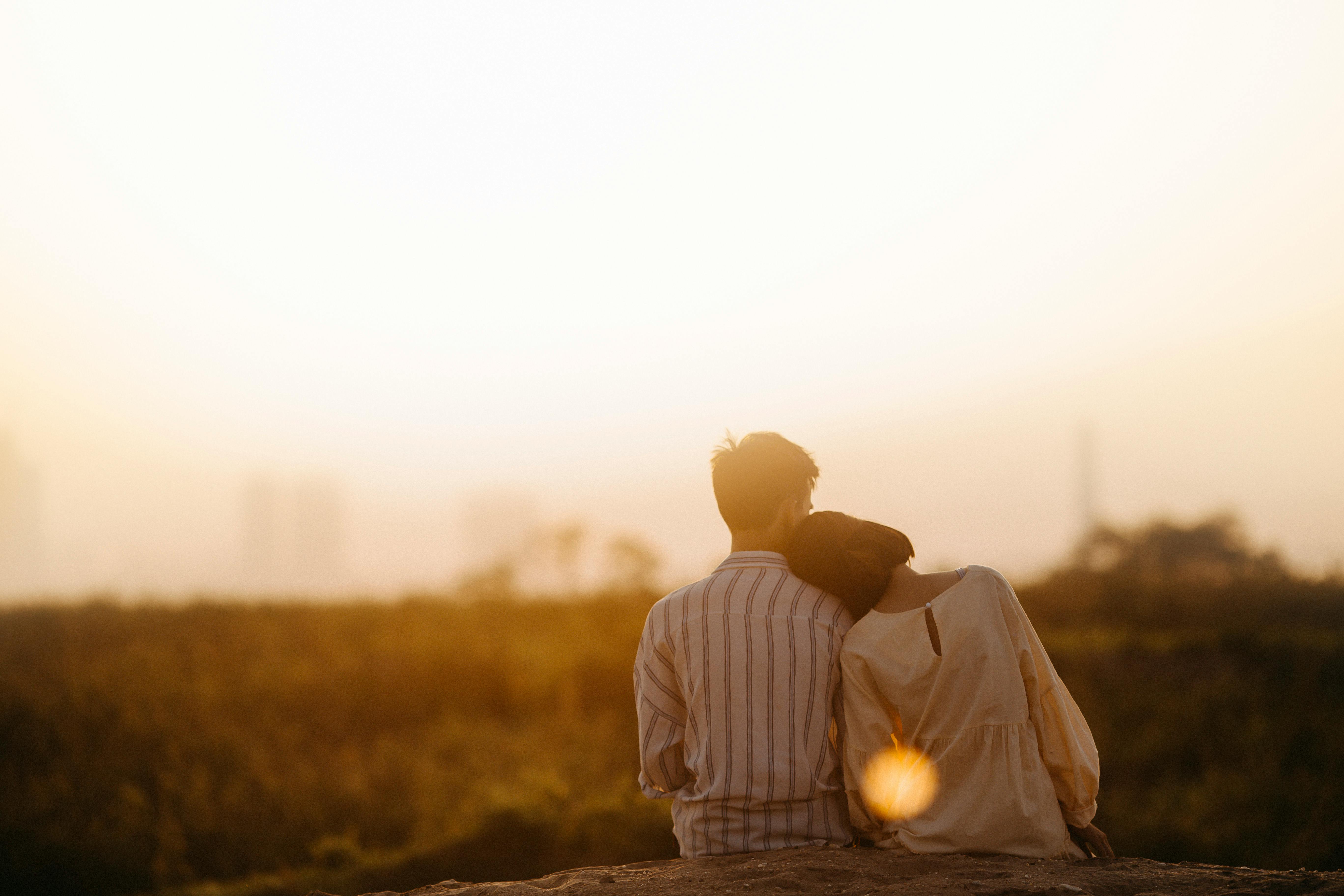 Man and woman near a field | Source: Pexels