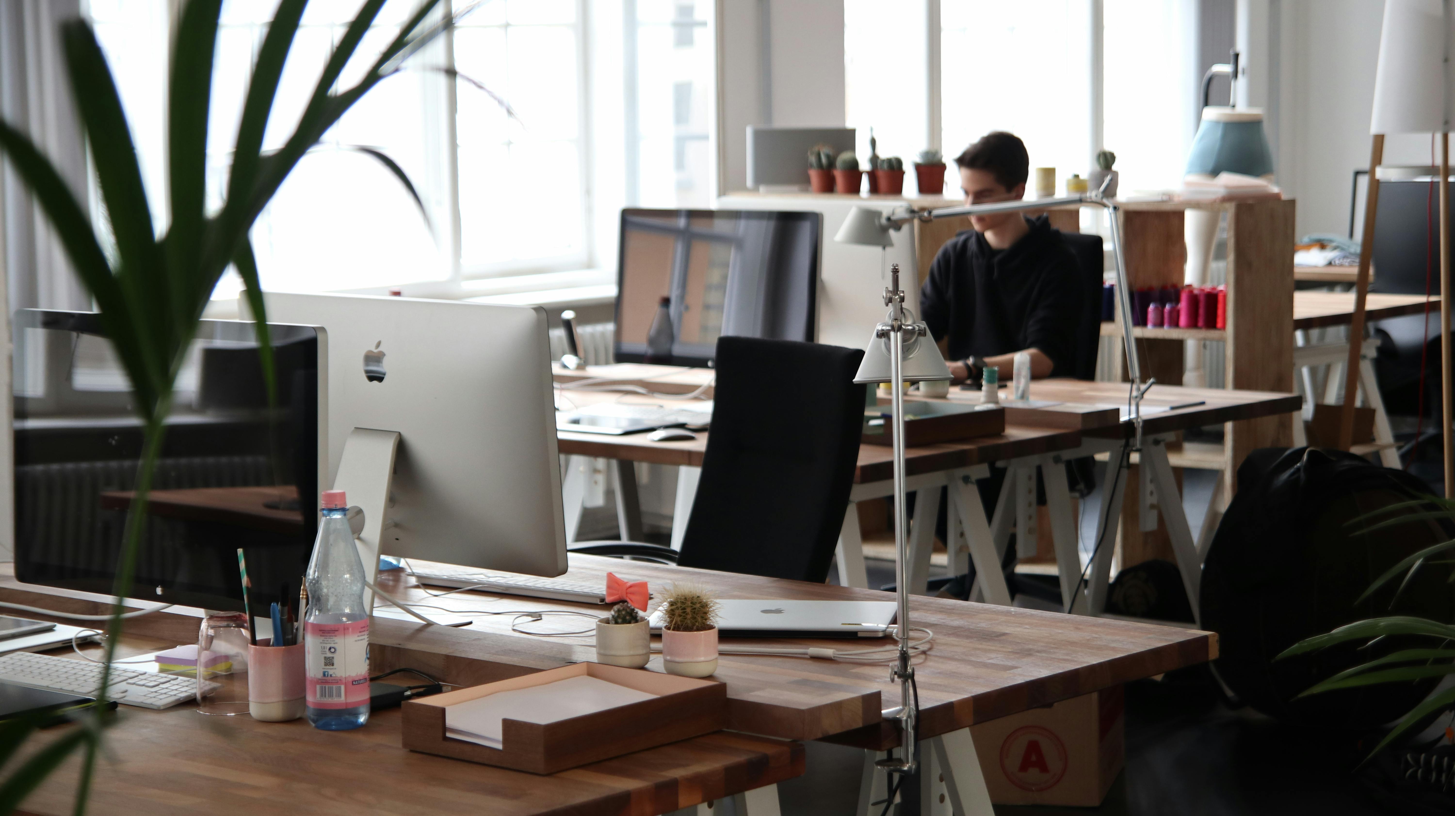 A person sitting in front of a computer | Source: Pexels