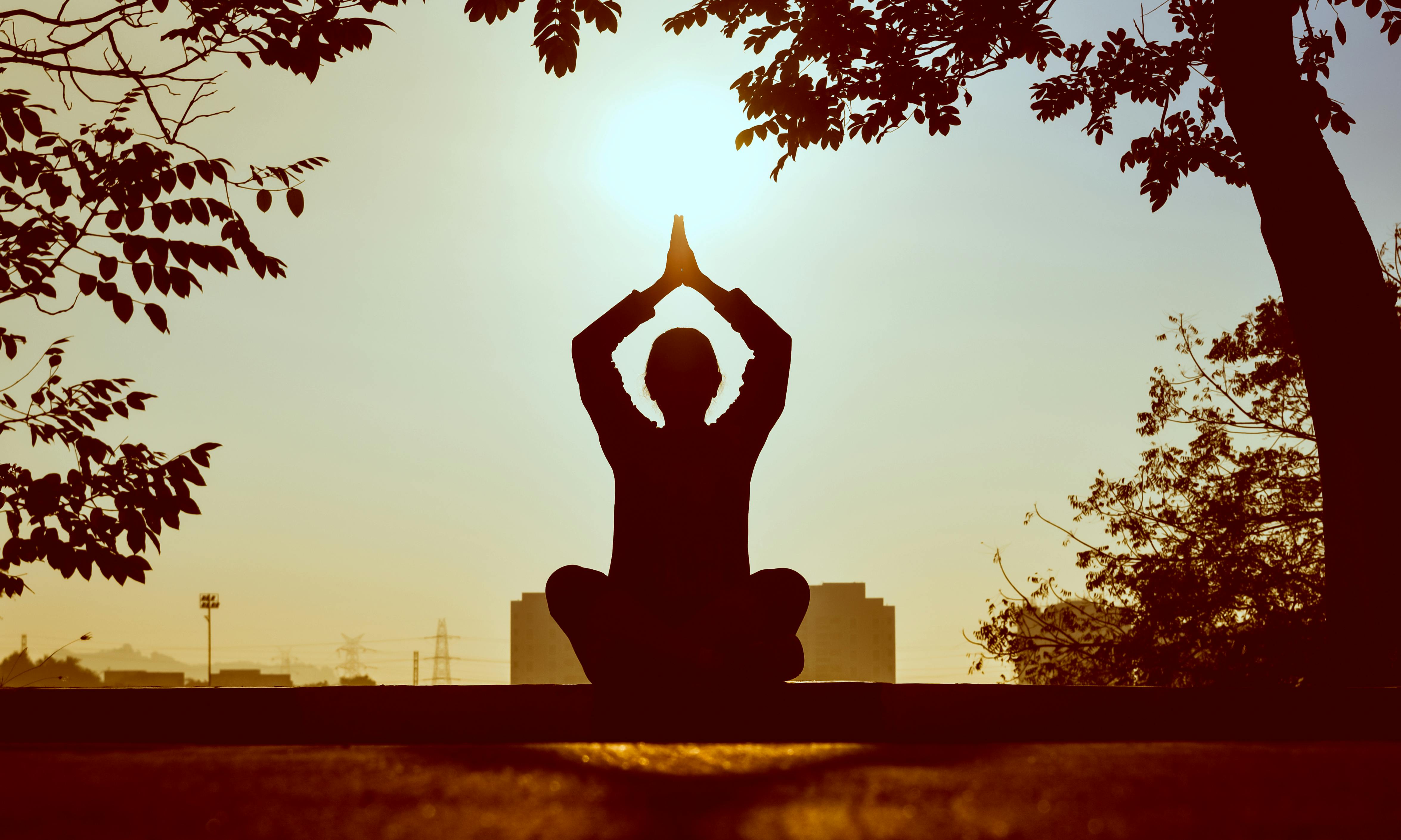 Woman doing Yoga | Source: Pexels